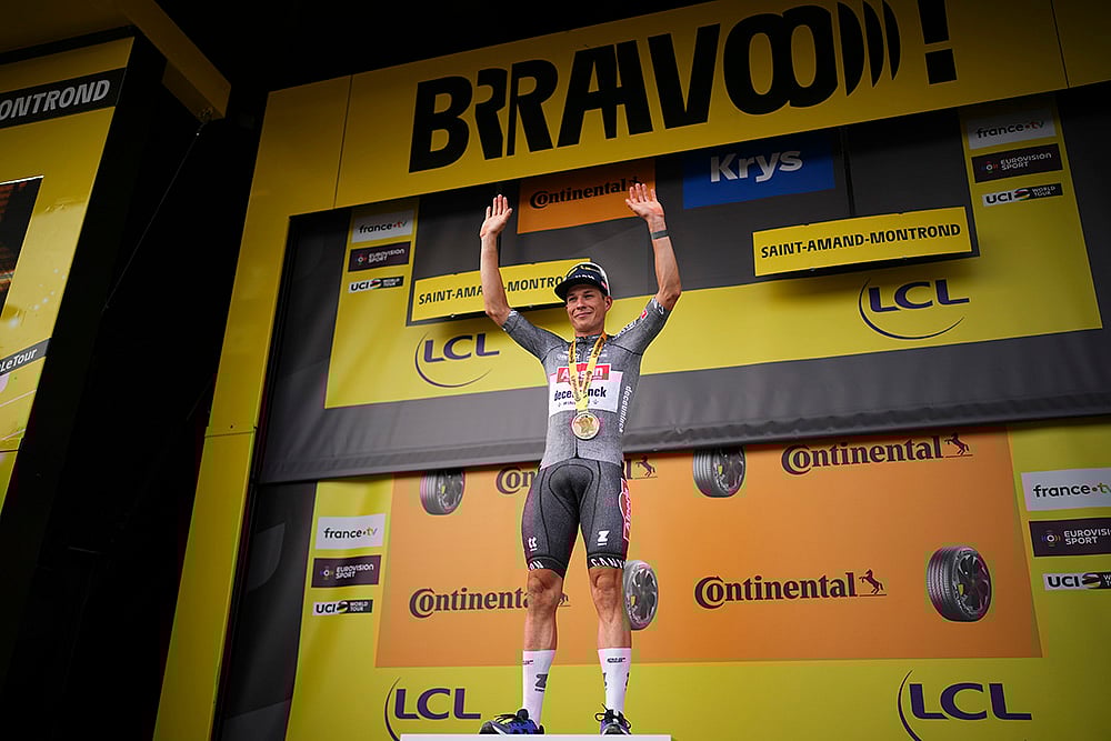 | Photo: AP/Daniel Cole : 10th Stage winner Jasper Philipsen celebrates on the podium